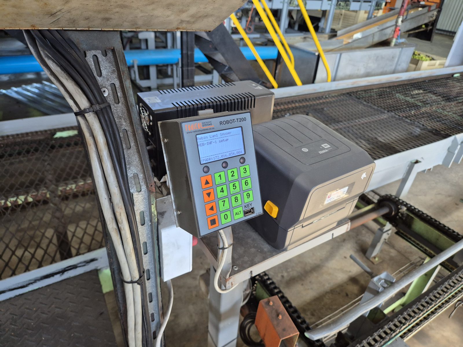 Robot T201 — conveyor-mounted terminal