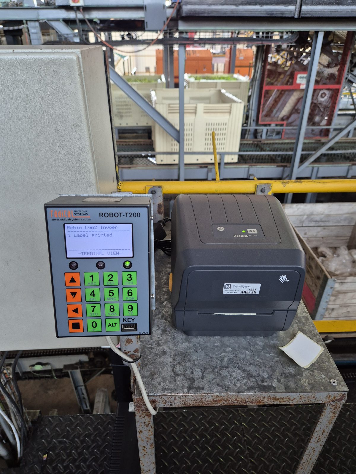 Robot T201 — weigh & label station